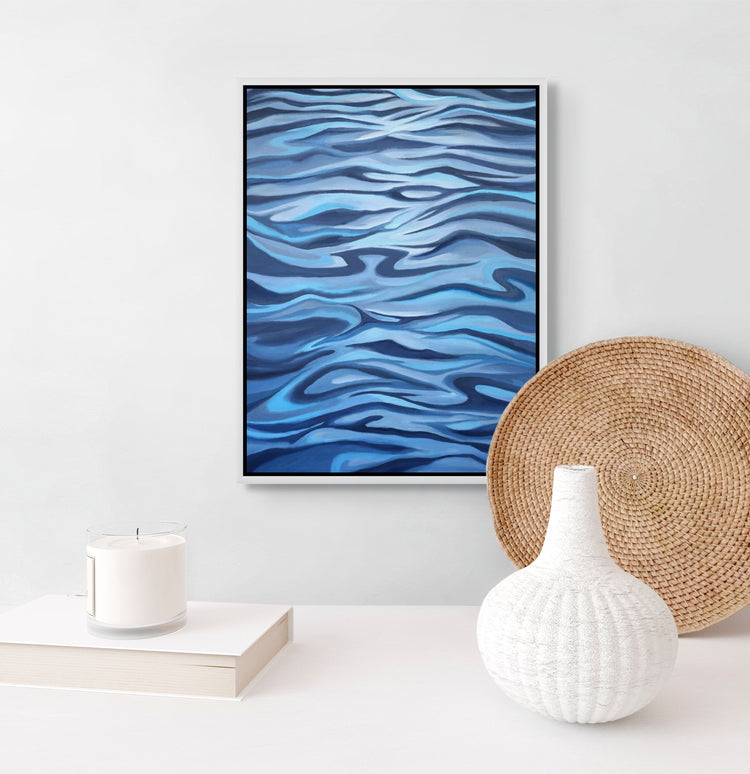 Blue Tide original painting displayed in home, coastal artwork by Ellie Antonacci
