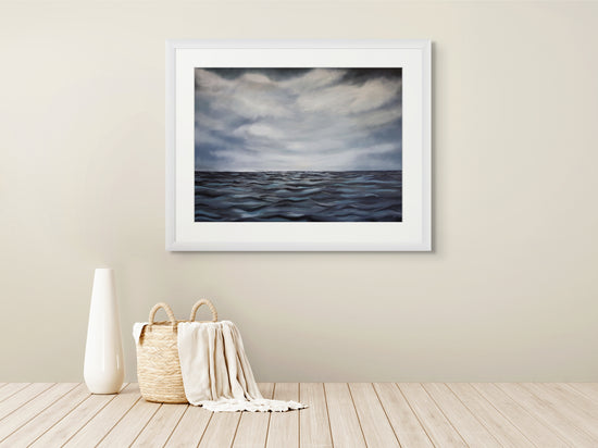 Still Horizon art print framed on wall, coastal painting by Ellie Antonacci