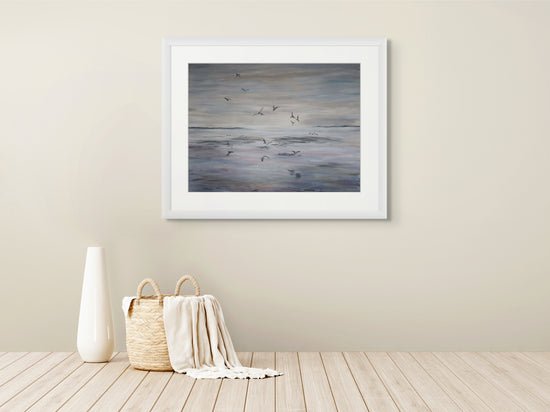 Tidal Flight art print framed on wall, coastal painting by Ellie Antonacci