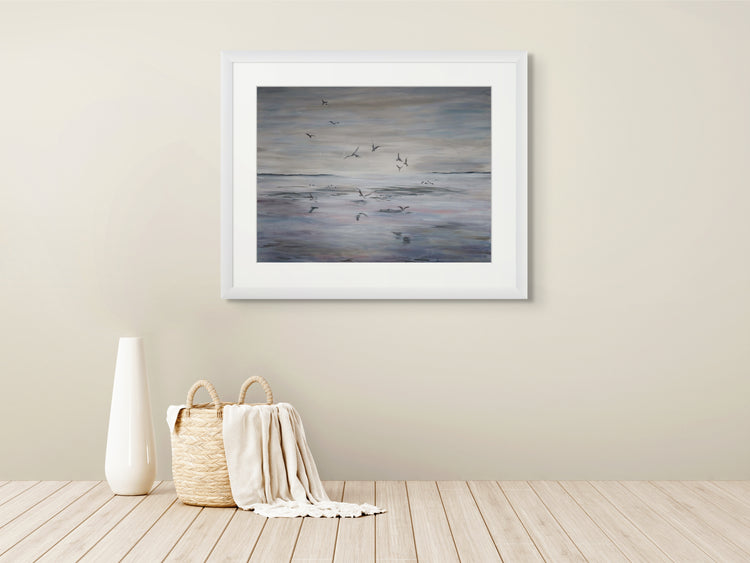 Tidal Flight art print framed on wall, coastal painting by Ellie Antonacci
